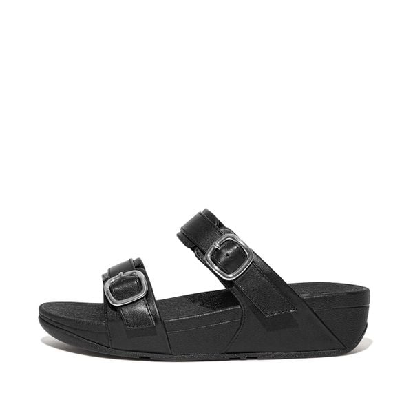 Kobiece klapki na koturnie FitFlop Lulu. Czarne klapki damskie FIT FLOP, bez wzorów, z materiału, eleganckie, bez obcasa, na koturnie. Za 534.50 zł.