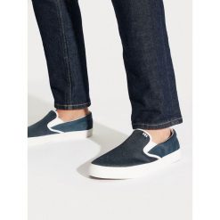 Tenisówki Helly Hansen. Niebieskie trampki męskie Helly Hansen, bez wzorów, bez zapięcia. Za 169.99 zł.
