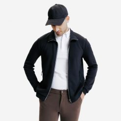 Bluza jeździecka męska 500. Czarne bluzy męskie FOUGANZA, m, bez wzorów, z bawełny, bez kaptura. Za 49.99 zł.