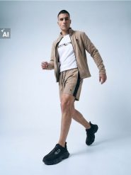 Szorty sportowe SNSY PERFORMANCE - beżowy. Brązowe krótkie spodenki sportowe męskie Sinsay, l, bez wzorów. Za 39.99 zł.