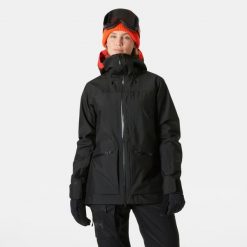 Damska kurtka narciarska Helly Hansen Powderqueen 3.0. Czarne kurtki snowboardowe damskie Helly Hansen, na zimę, bez wzorów, bez kaptura, narciarskie. W wyprzedaży za 1,676.50 zł.