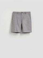 Szorty carrot fit - ciemnobrązowy. Brązowe szorty męskie Reserved, l, bez wzorów, z bawełny. Za 129.99 zł.