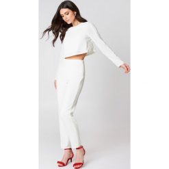 Hannalicious x NA-KD Spodnie w pasy z cekinami - White. Spodnie materiałowe damskie Hannalicious x NA-KD. W wyprzedaży za 48.58 zł.