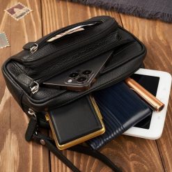 Paolo Peruzzi Saszetka męska do ręki skórzana czarna pojemna T-130-BL. Czarne saszetki męskie Paolo Peruzzi. Za 178.58 zł.