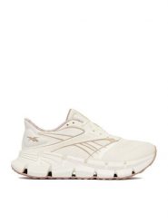 Reebok Buty do biegania EO-FLOATZIG 2 100263824 Kremowy. Białe obuwie sportowe damskie Reebok, bez wzorów, z materiału, do biegania. Za 489.99 zł.