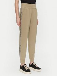 Guess Spodnie dresowe W5RB00 KBYE2 Zielony Regular Fit. Zielone spodnie dresowe damskie Guess, xs, z aplikacjami, z dresówki. Za 349.99 zł.