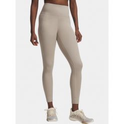 Legginsy Damskie Under Armour Meridian Ankle Leg. Brązowe legginsy sportowe damskie Under Armour, bez wzorów, do biegania. Za 399.00 zł.