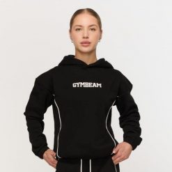 Bluza damska fitness z kapturem czarna Varsity. Czarne bluzy damskie GYMBEAM, m, bez wzorów, z bawełny, z kapturem, na fitness i siłownię. Za 139.90 zł.