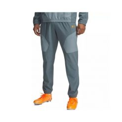 Spodnie dresowe Under Armour CHALLENGER WARMUP. Brązowe spodnie sportowe męskie Under Armour, l, bez wzorów, z dresówki, na fitness i siłownię. Za 338.20 zł.