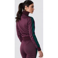 NA-KD Bluza sportowa z suwakiem - Purple. Fioletowe bluzy sportowe damskie marki NA-KD, w paski, z poliesteru. Za 202.95 zł.