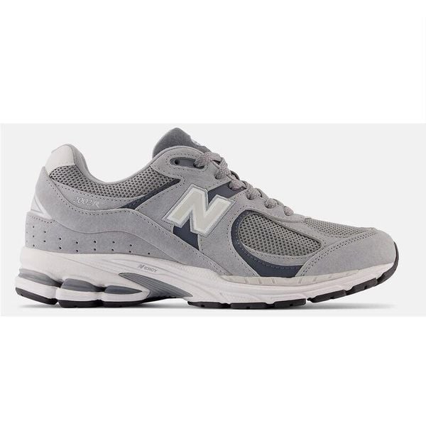 Trampki New Balance Sr. Białe trampki męskie New Balance, bez wzorów, z materiału, eleganckie, bez zapięcia. Za 853.99 zł.