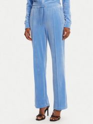 Juicy Couture Spodnie dresowe Tina JCAPW045 Niebieski Regular Fit. Niebieskie spodnie dresowe damskie Juicy Couture, xs, bez wzorów, z dresówki. Za 399.99 zł.