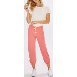 Femi Stories - Spodnie RUMBA. Czerwone legginsy damskie Femi Stories, s, bez wzorów, z bawełny, climacool (adidas). W wyprzedaży za 179.90 zł.