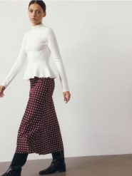 Spódnica midi - wielobarwny. Spódnice damskie Reserved, l, bez wzorów, z tkaniny, midi, rozkloszowane. W wyprzedaży za 49.99 zł.