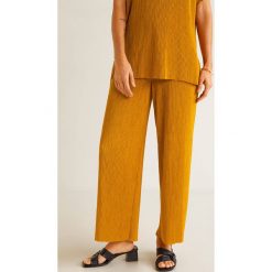 Mango - Spodnie Currito. Żółte spodnie materiałowe damskie marki Mango, z dzianiny. Za 139.90 zł.