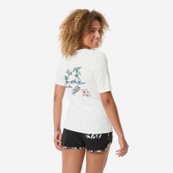 Top UV surfingowy damski Decathlon Malou Paradise krótki rękaw. Białe t-shirty damskie Decathlon, l, bez wzorów, z dzianiny, sportowe, bez kołnierzyka. Za 49.99 zł.