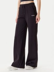 Guess Spodnie dresowe V5YB03 KCX22 Czarny Regular Fit. Czarne spodnie dresowe damskie Guess, m, z aplikacjami, z dresówki. Za 279.99 zł.