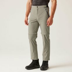 Spodnie turystyczne męskie Travel Light Zip Off Packaway z odpinanymi nogawkami. Brązowe spodnie sportowe męskie Regatta, m, bez wzorów, z materiału, trekkingowe. W wyprzedaży za 228.30 zł.