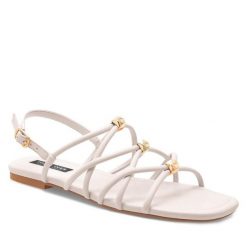 Sandały Nine West. Białe sandały damskie Nine West, bez wzorów, bez obcasa, na płaskiej podeszwie, bez zapięcia. Za 159.99 zł.
