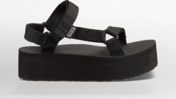 Teva Sandały damskie Flatform Universal czarne r. 387 (1008844). Czarne sandały damskie Teva, bez wzorów, bez obcasa, bez zapięcia. Za 244.17 zł.