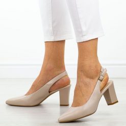 Cieliste czółenka damskie na słupku z odkrytą pietą Sergio Leone Sk162. Czółenka damskie Sergio Leone, bez wzorów, ze skóry, eleganckie, bez obcasa, na słupku, bez zapięcia. Za 159.00 zł.