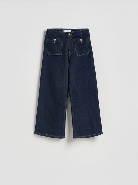 Spodnie culotte - granatowy. Niebieskie spodnie materiałowe damskie Reserved, bez wzorów, z bawełny. W wyprzedaży za 45.99 zł.