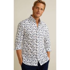 Mango Man - Koszula Dani. Białe koszule męskie marki Mango Man, bez wzorów, z bawełny, bez kołnierzyka, bez ramiączek. Za 139.90 zł.