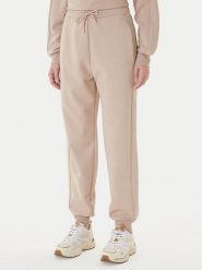 Guess Spodnie dresowe V5BB23 KCX22 Beżowy Regular Fit. Brązowe spodnie dresowe damskie Guess, l, z aplikacjami, z dresówki. Za 479.99 zł.