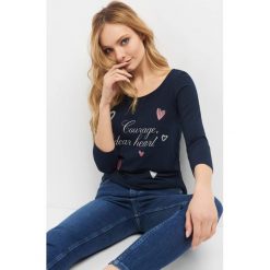 Koszulka z nadrukiem i napisem. T-shirty damskie marki Orsay. Za 29.99 zł.