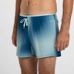 Szorty krótkie pływackie męskie Nabaiji 100 Camo. Niebieskie kąpielówki męskie NABAIJI, m, bez wzorów, z elastanu, krótkie, do pływania. Za 79.99 zł.