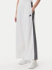 Adidas Spodnie dresowe Essentials 3-Stripes JE1307 Biały Loose Fit. Białe spodnie dresowe damskie Adidas, m, bez wzorów, z dresówki. Za 179.99 zł.