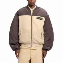 Kurtka REEBOK BOMBER JACKET Brązowy. Brązowe kurtki damskie Reebok, bez wzorów, z tkaniny, bez kaptura. Za 560.99 zł.