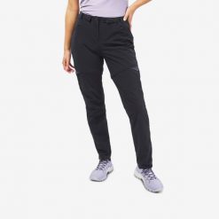 Spodnie turystyczne damskie MH550 2w1. Czarne spodnie sportowe damskie QUECHUA, l, bez wzorów, z elastanu, trekkingowe. Za 179.99 zł.