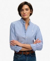 Superdry Damska Koszula Slim Oxford z Długim Rękawem z Bawełny Organicznej. Niebieskie koszule damskie Superdry., bez wzorów, z bawełny, bez kołnierzyka, bez ramiączek. Za 314.00 zł.