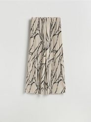 Wzorzyste spodnie - beżowy. Brązowe spodnie materiałowe damskie Reserved, l, bez wzorów, z dzianiny. Za 109.99 zł.