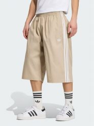 Adidas Szorty sportowe Adicolor Twill KR1388 Beżowy Relaxed Fit. Brązowe krótkie spodenki sportowe męskie Adidas, l, bez wzorów, z bawełny. Za 279.99 zł.