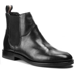 Sztyblety MARC O'POLO - 808 14895002 100 Black 990. Czarne kozaki damskie Marc O'Polo, z materiału, bez obcasa, na obcasie. W wyprzedaży za 449.00 zł.