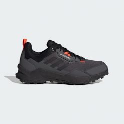 Buty turystyczne Terrex AX4. Czerwone trekkingi męskie Adidas, wspinaczkowe. Za 499.99 zł.