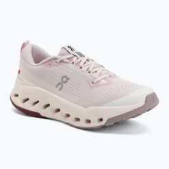 Buty do biegania damskie On Running Cloudsurfer Trail 2. Czerwone obuwie sportowe damskie On, bez wzorów, z materiału, do biegania. Za 825.45 zł.