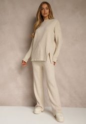 Jasnobeżowy Komplet z Wełną i Bawełną Sweter z Guzikami i Szerokie Spodnie Reinelia. Brązowe spodnie materiałowe damskie Renee, s, bez wzorów, z bawełny, bez kołnierzyka, bez ramiączek, bez kaptura. Za 139.99 zł.
