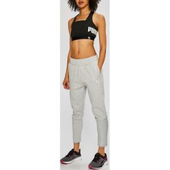 Puma - Spodnie. Szare spodnie sportowe damskie Puma, z bawełny. W wyprzedaży za 199.90 zł.
