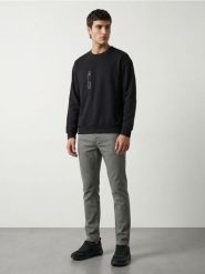 Bawełniane jeansy slim fit - zielony. Zielone jeansy męskie Sinsay. Za 79.99 zł.
