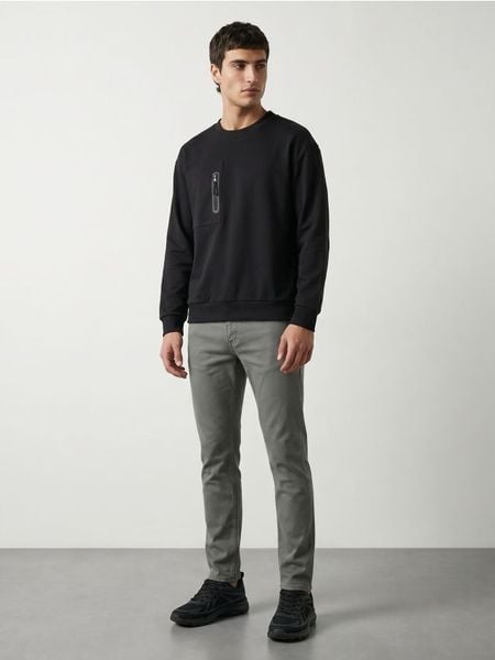 Bawełniane jeansy slim fit - zielony. Zielone jeansy męskie Sinsay. Za 79.99 zł.