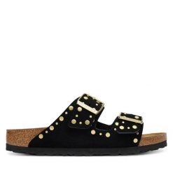 Klapki Birkenstock. Czarne klapki damskie Birkenstock, bez wzorów, bez obcasa. Za 639.99 zł.
