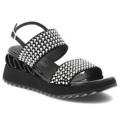 Sandały damskie S.Barski, cholewka ze skóry naturalnej na masywnej podeszwie z ozdobnymi nitami na szerokich paskach łączą rockowy charakter z komfor. Czarne klapki damskie S.BARSKI, bez wzorów, ze skóry, bez obcasa, na koturnie, bez zapięcia. Za 309.00 zł.