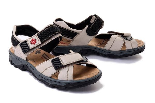 RIEKER 68851-80 white, sandały damskie. Brązowe sandały damskie Rieker, bez wzorów, bez obcasa, bez zapięcia. Za 223.93 zł.