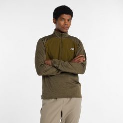 Bluza męska New Balance MT43204WOO – zielona. Zielone bluzy sportowe męskie New Balance, m, bez wzorów, z materiału, bez kaptura, do biegania. Za 389.99 zł.