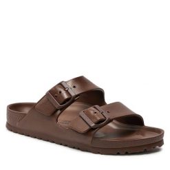 Klapki Birkenstock. Brązowe klapki damskie Birkenstock, bez wzorów, bez obcasa. Za 179.99 zł.