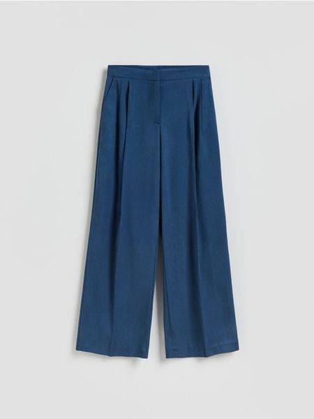 Spodnie wide leg z lyocellem - jasnoniebieski. Niebieskie spodnie materiałowe damskie Reserved, l, bez wzorów, z lyocellu. Za 159.99 zł.