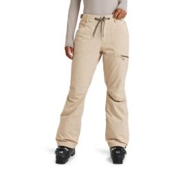 Spodnie snowboardowe damskie ROXY Nadia. Brązowe spodnie materiałowe damskie Roxy, bez wzorów, snowboardowy. Za 629.99 zł.